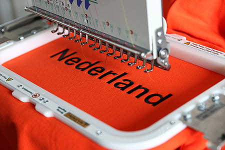 white and red sewing machine thumbnail
