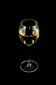 long-stem wine glass filed with liquid thumbnail