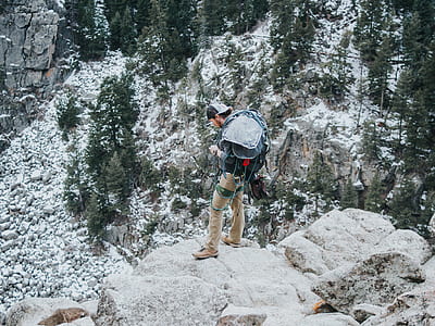person standing on cliff thumbnail