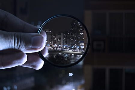 Person Holding Magnifying Glass thumbnail