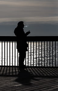 silhouette of man photo thumbnail