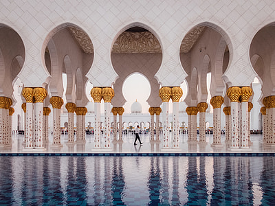 person walks beside body of water thumbnail