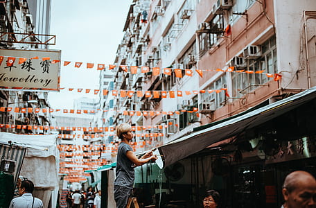 man holding awning thumbnail