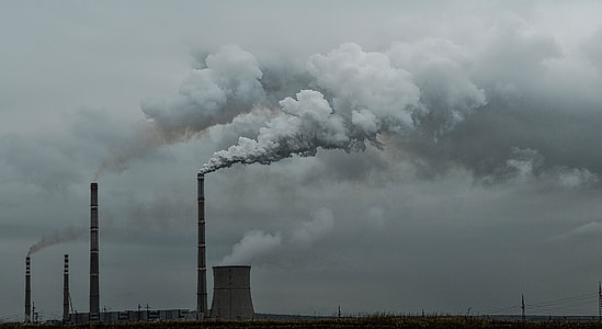 photo of factory during cloudy sky thumbnail
