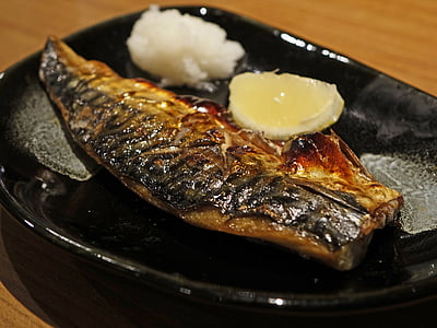 fried fish in black tray thumbnail