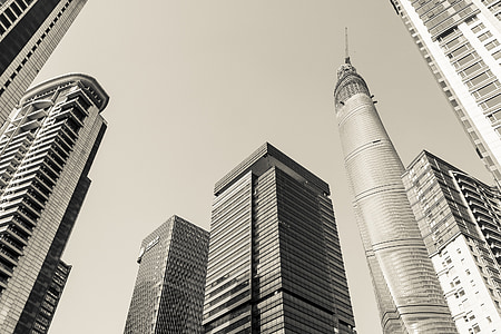 assorted concrete building during daytime thumbnail