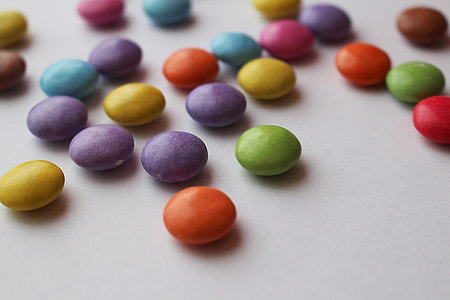 selective focus photography of assorted-color milk chocolate chips thumbnail