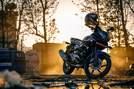 black naked motorcycle on road thumbnail