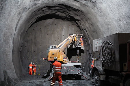 yellow and gray heavy equipment with lift in gray cave thumbnail