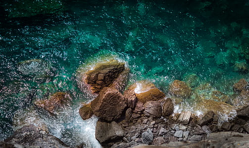 body of water across rock formation thumbnail