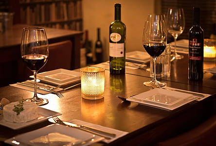 dinner setup on brown wooden table thumbnail