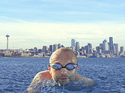 man on body of water facing camera thumbnail