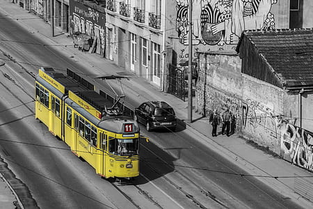 yellow city tram selective color photo thumbnail