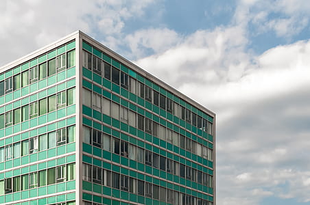 green and white city bulding thumbnail