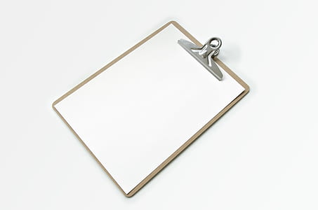 white printer paper on brown clip board thumbnail