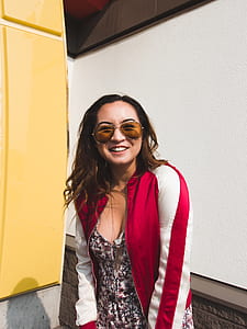 photo of woman in red and white full-zip jacket thumbnail