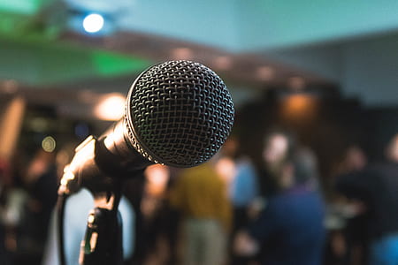 selective focus photography of black dynamic microphone thumbnail