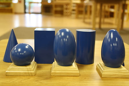 several blue vases on wooden table thumbnail
