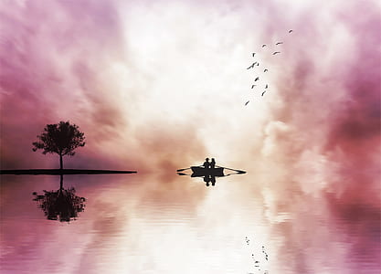 silhouette photography of person riding on boat thumbnail