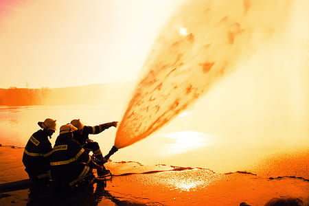 three group of firefighters holding hose thumbnail