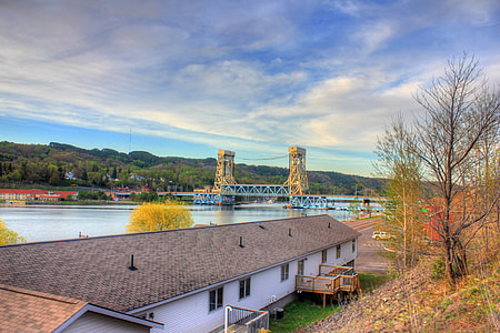 Houses, bridge, and sky in the Upper Peninsula, Michigan thumbnail