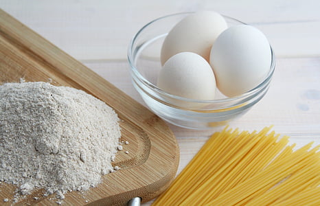 three white eggs on glass bowl thumbnail