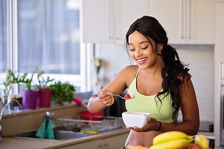 Woman Holding White Ceramic Bowl thumbnail