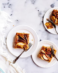 white plastic plate with fried bread desert thumbnail
