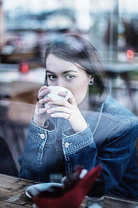 woman drinking white cup thumbnail