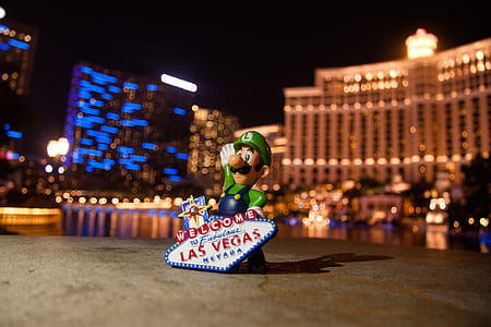 Luigi figurine in front of building thumbnail