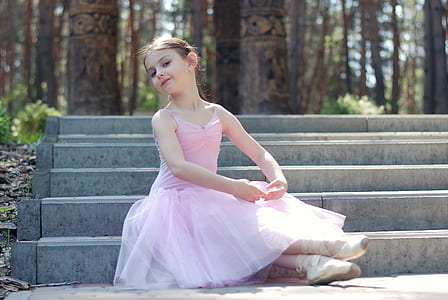 girl wearing a pink ballerina suit thumbnail