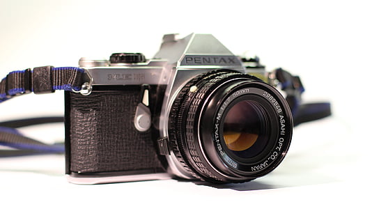 black Pentax DSLR camera thumbnail