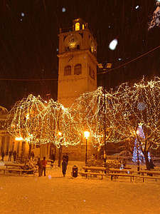 The clock tower during Christmas with Lights in Kozani, Greece thumbnail