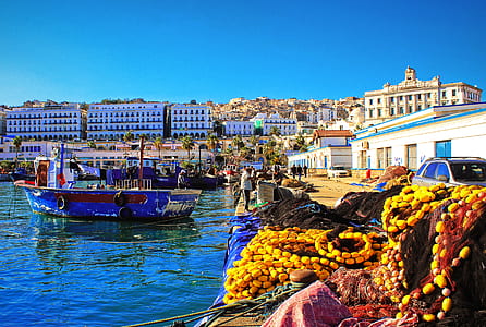 Blue Fishing Boat by the Dock thumbnail