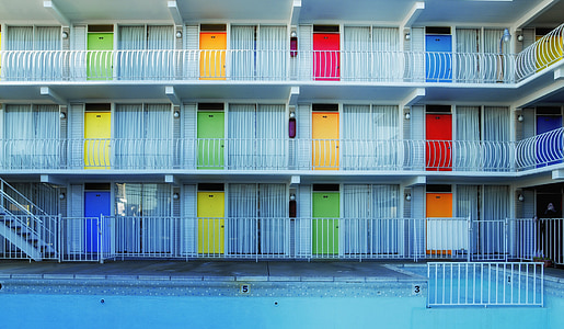 white 3-storey building thumbnail