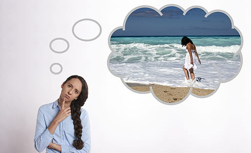 woman thinking of beach thumbnail