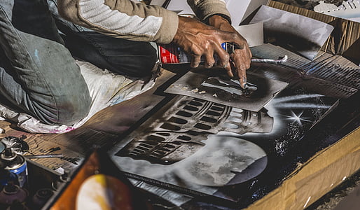 photo of man on painting thumbnail