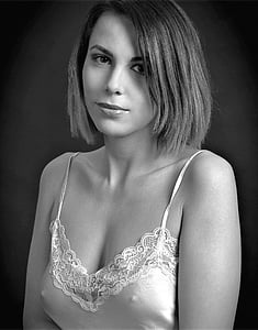 grayscale photograph of woman wearing spaghetti strap top thumbnail