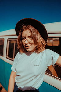 woman wearing white crew-neck t-shirt thumbnail