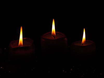 three candles with orange flames thumbnail