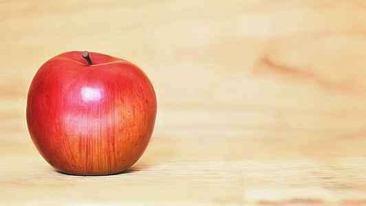 red apple fruit on top of brown surface thumbnail