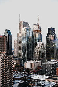architectural photography of high rise buildings thumbnail