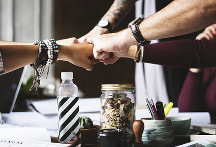 group of person doing fist bumps thumbnail