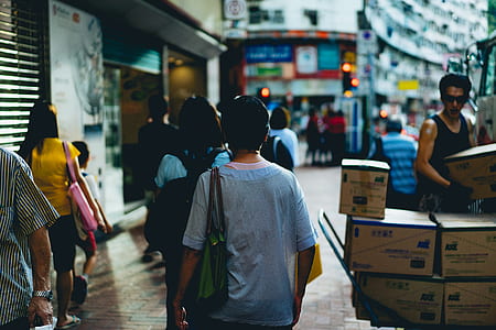 people walking on street during daytime thumbnail