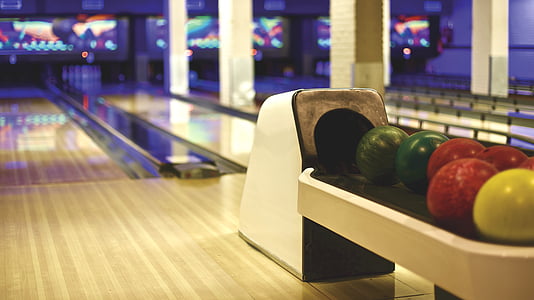 selective focus photo of bowling balls thumbnail