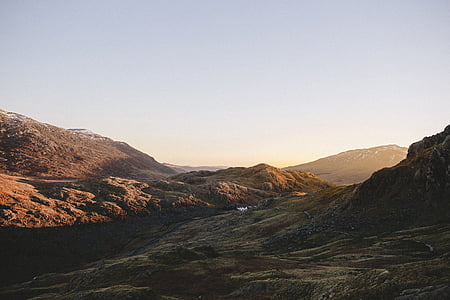 brown mountain hit by sunlight thumbnail
