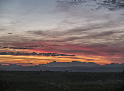 silhouette of mountain during dusk thumbnail
