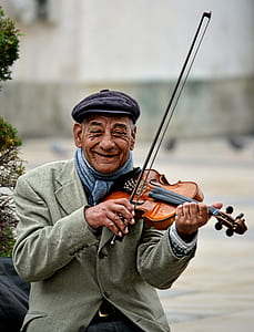 man using violin smiling thumbnail