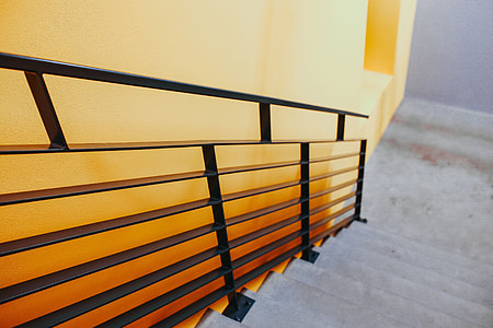 Staircase by a yellow wall thumbnail
