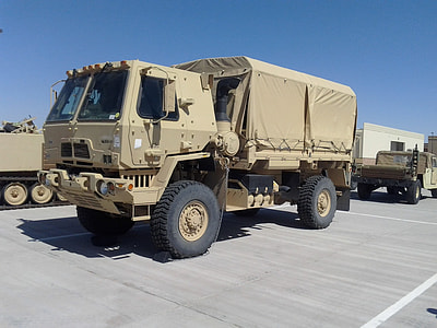 brown warfare truck photo during day time thumbnail